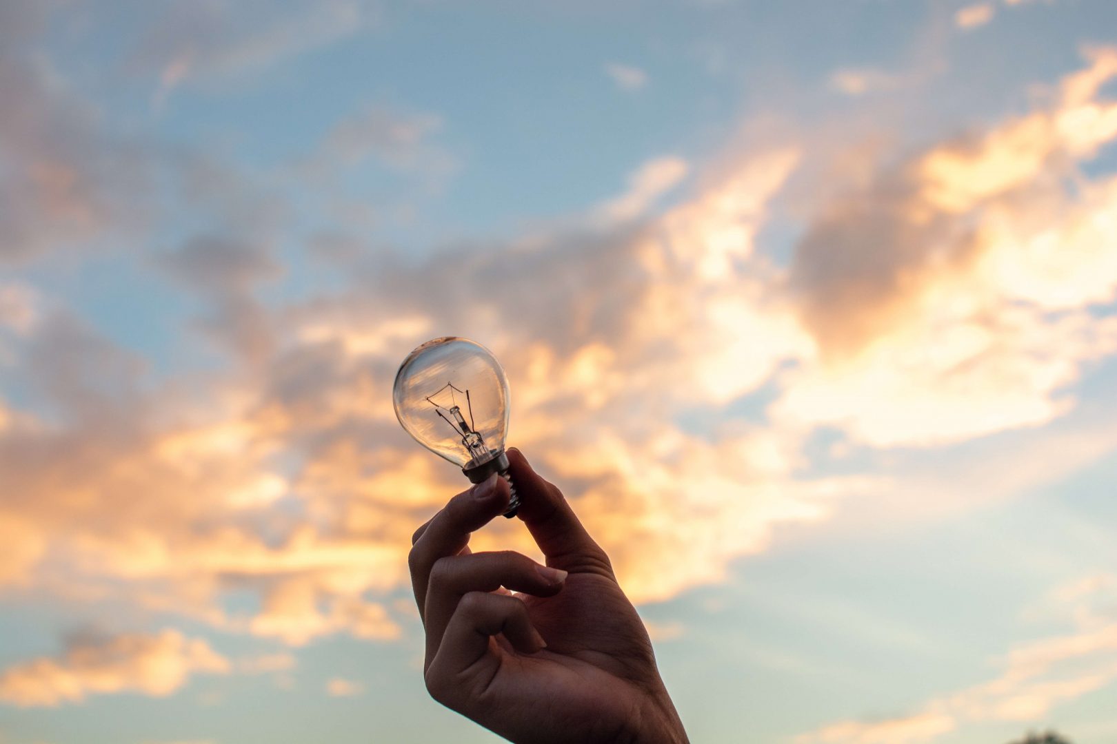 holding-a-lightbulb-idea