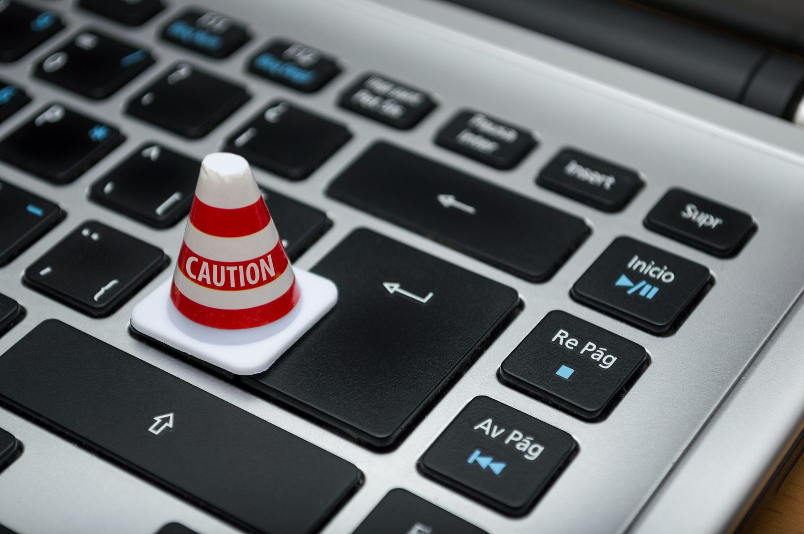 caution-cone-on-keyboard