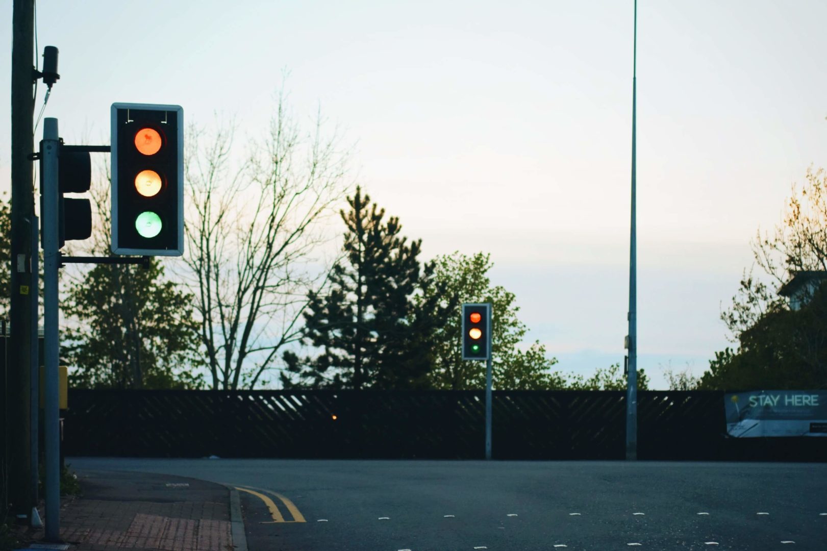 red-green-amber-traffic-lights-at-sunset
