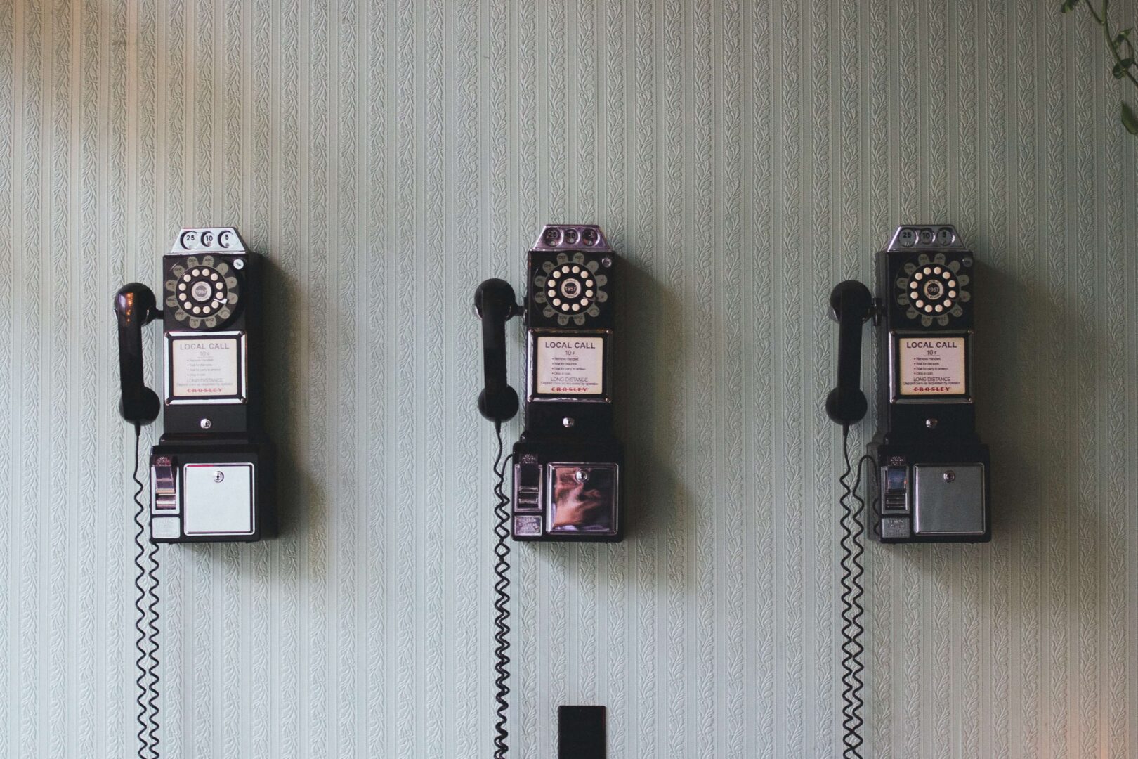 phones-on-wall-phone-numbers