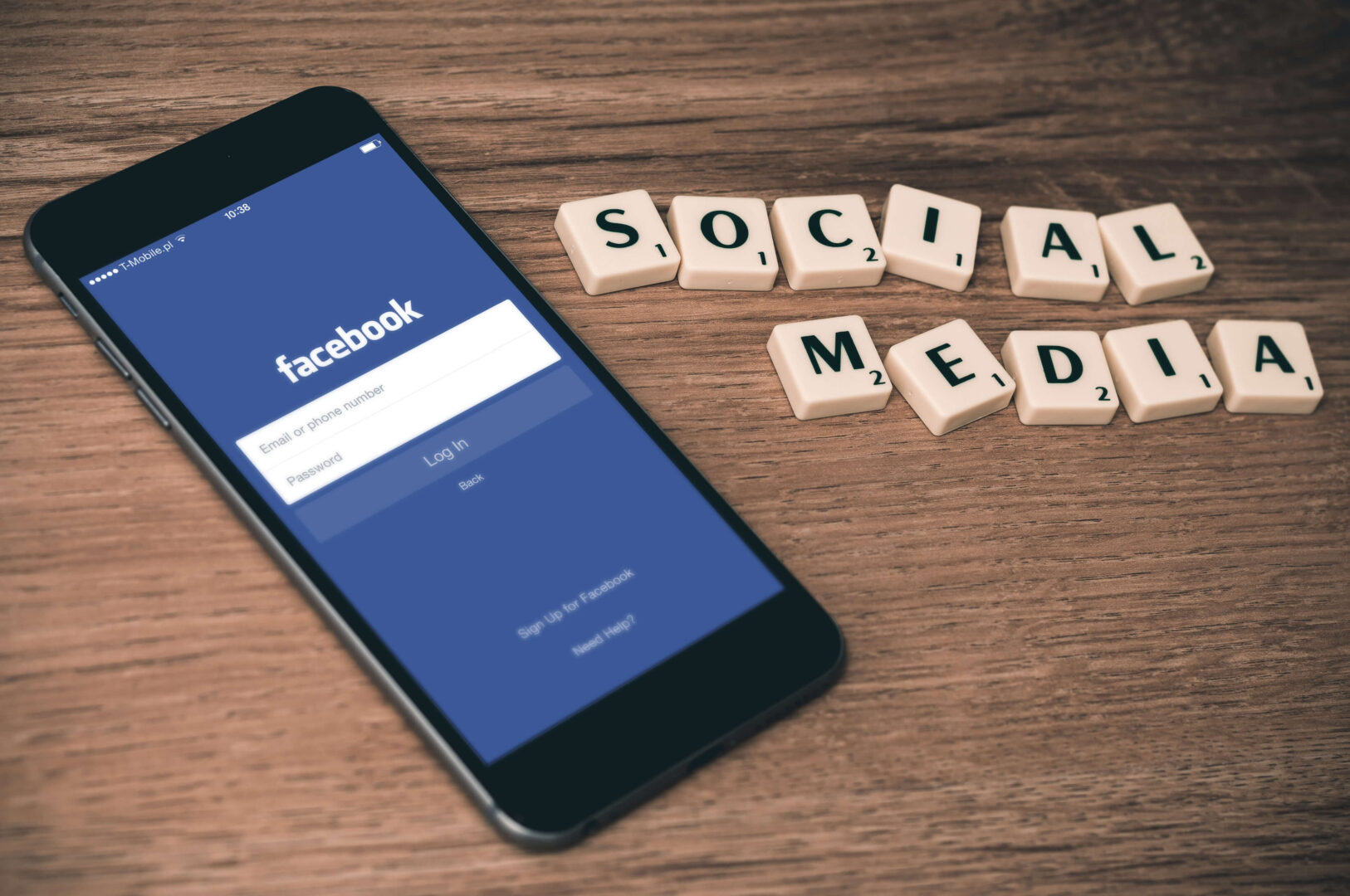 facebook-on-phone-next-to-scrabble-pieces-spelling-social-media