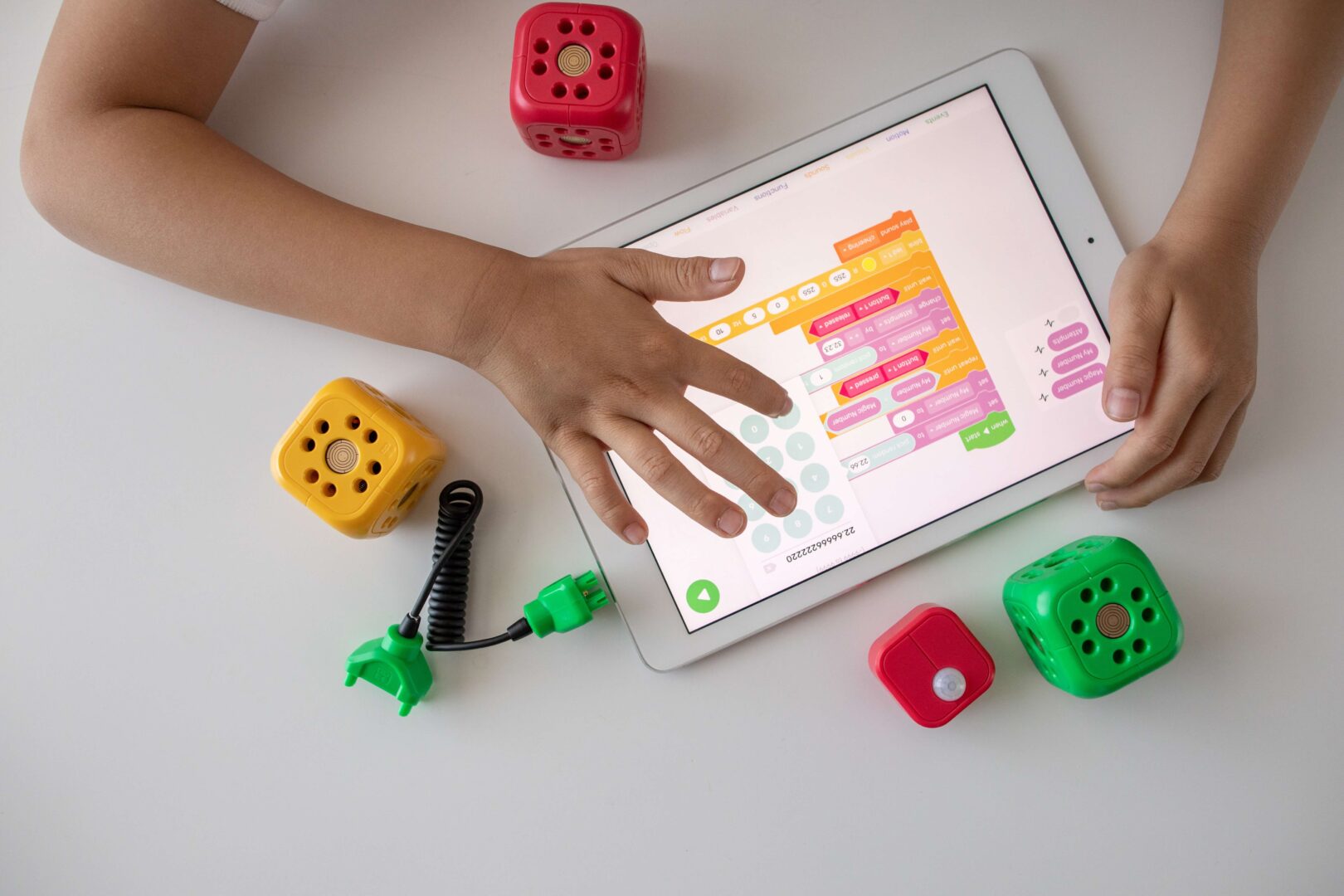 child playing on iPad