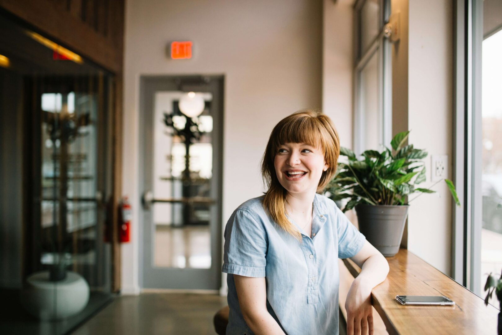 Woman sitting happily