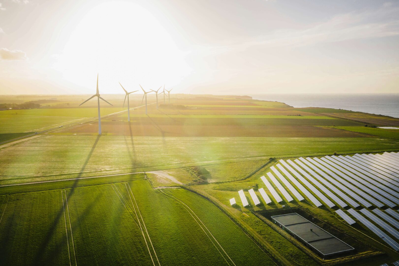 Wind and solar farm in field