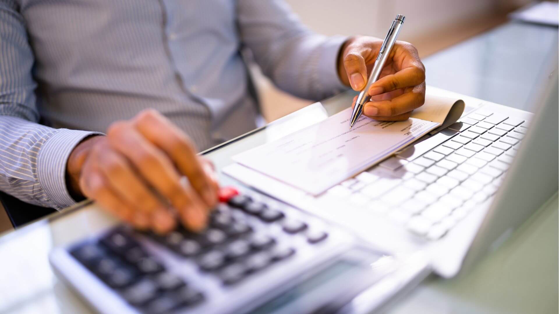 Employer Calculating Company Payroll