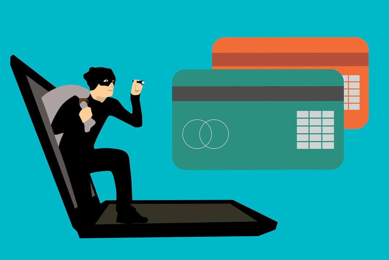 Image of a cartoon robber and credit cards.