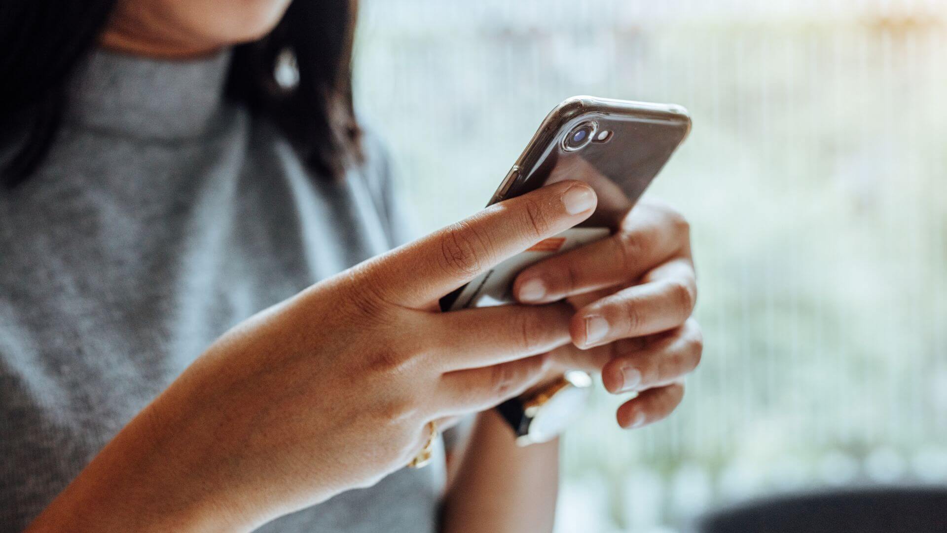 Woman Using Smartphone Device