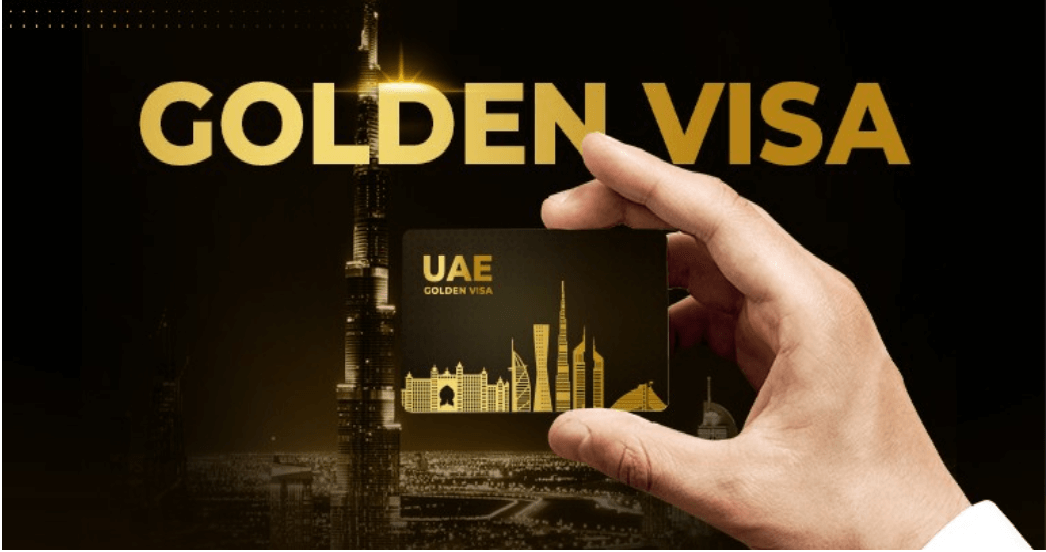 golden-visa-text-and-hand-holding-visa-card