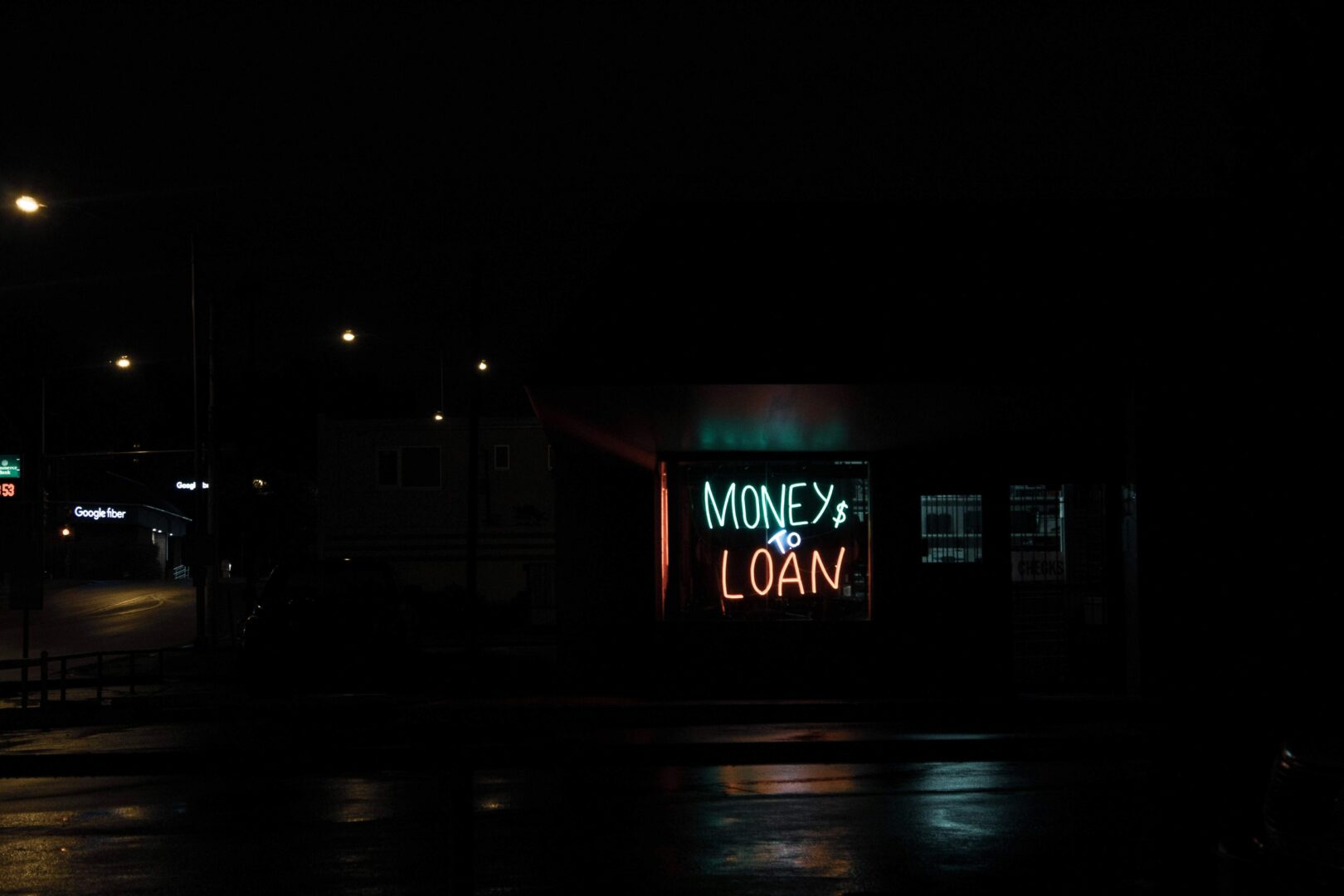 photo-of-neon-sign-reading-money-to-loan