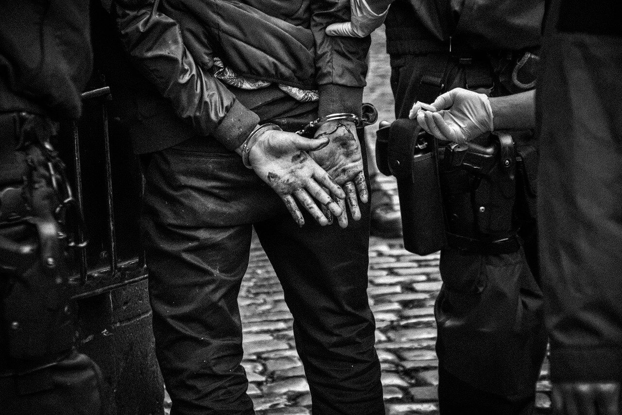 photograph-of-person-being-handcuffed