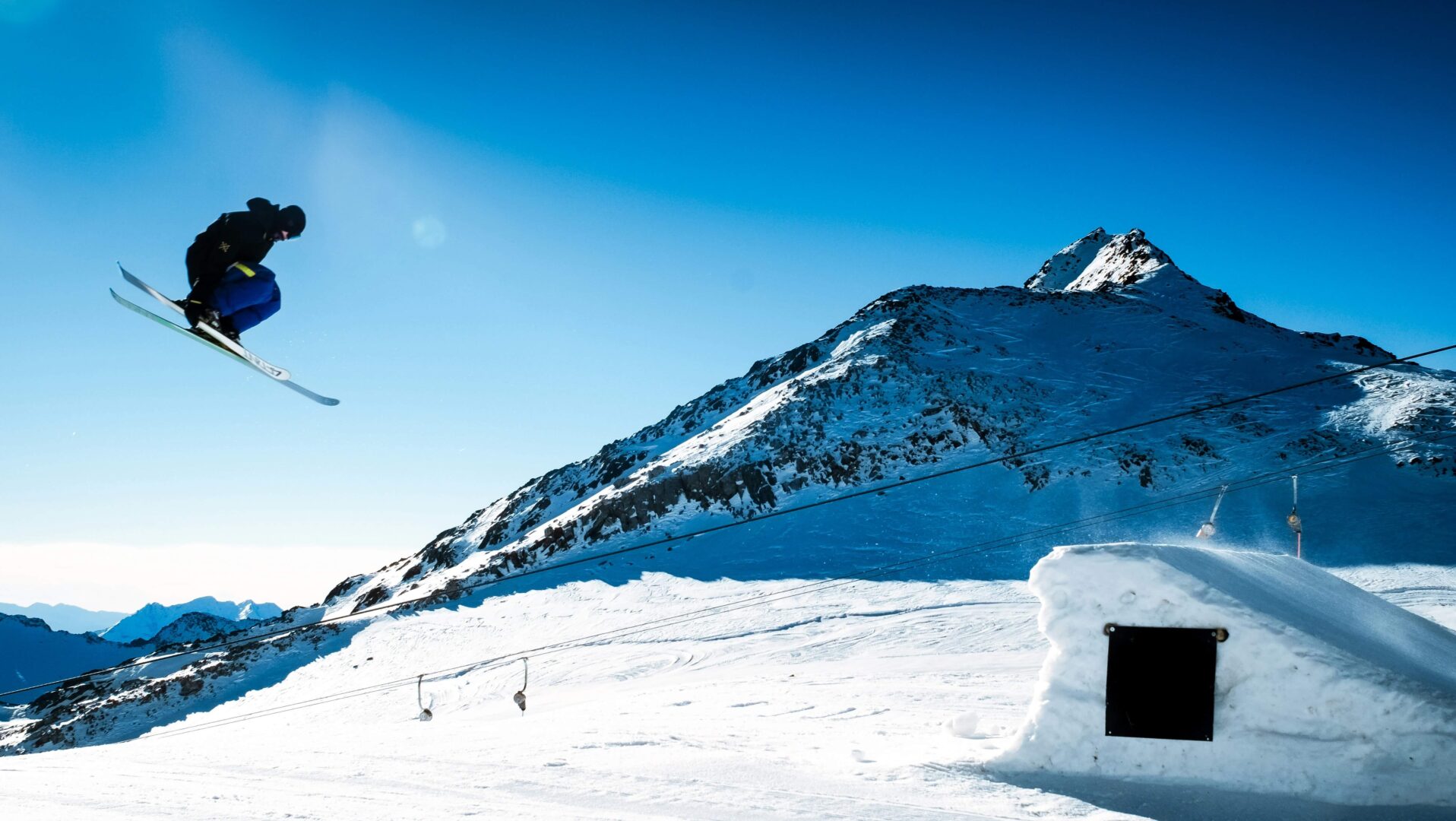 photgraph-of-skiier-jumping