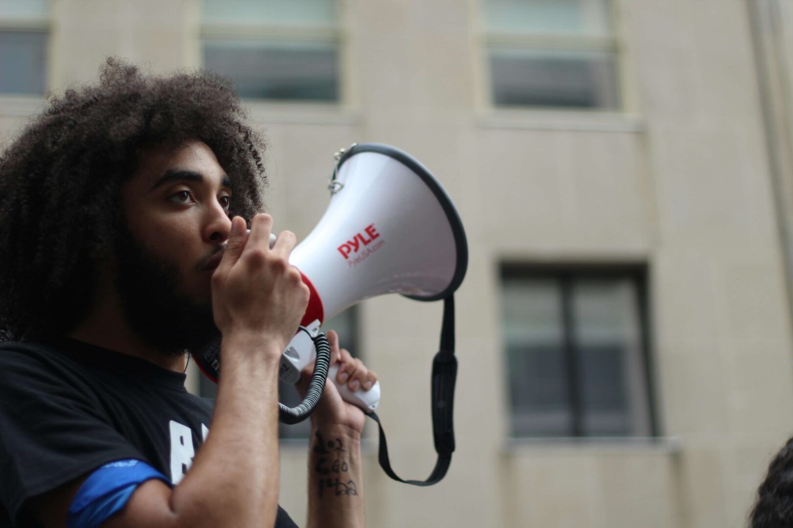 Man speaking through megaphone