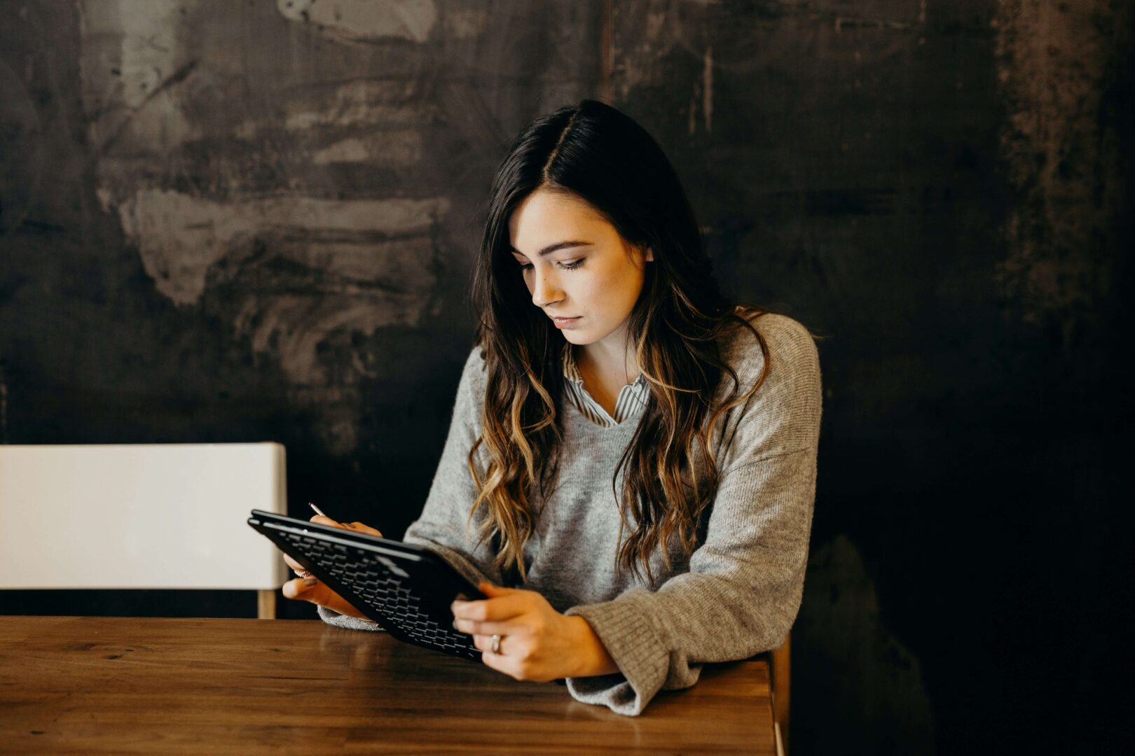 woman-looking-at-tablet