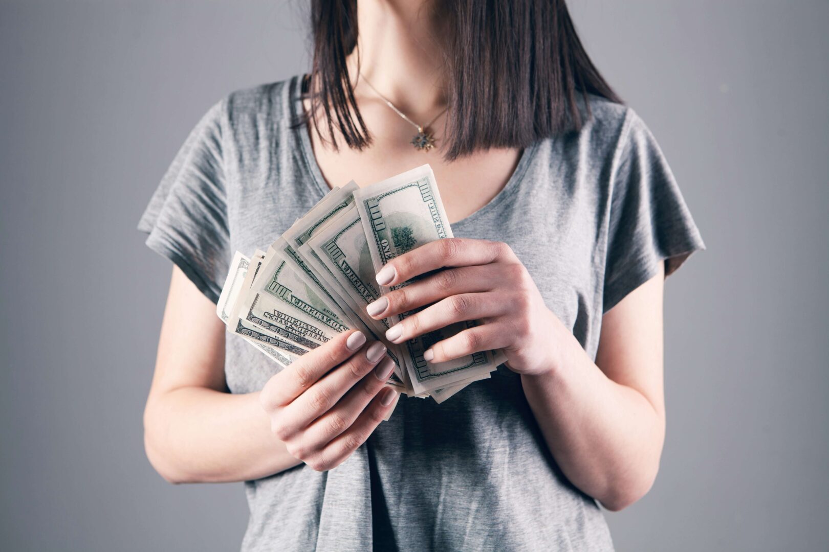 woman-holding-money
