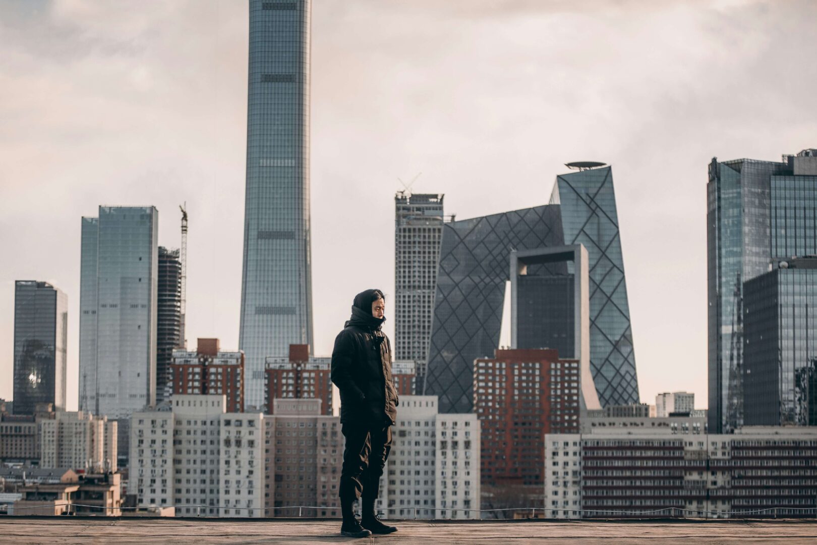 man-standing-on-top-of-building