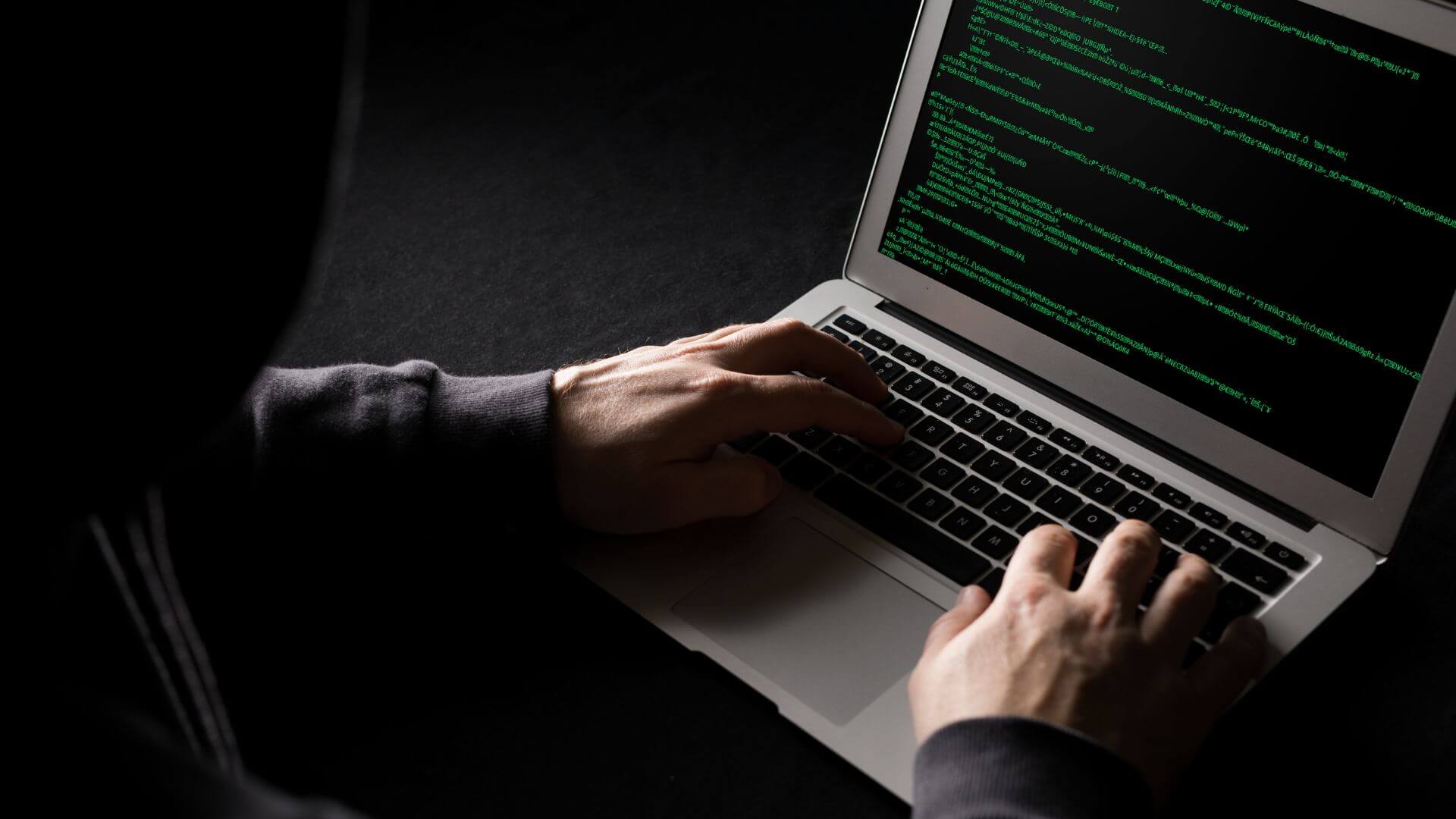 Man Hacking Into A Computer