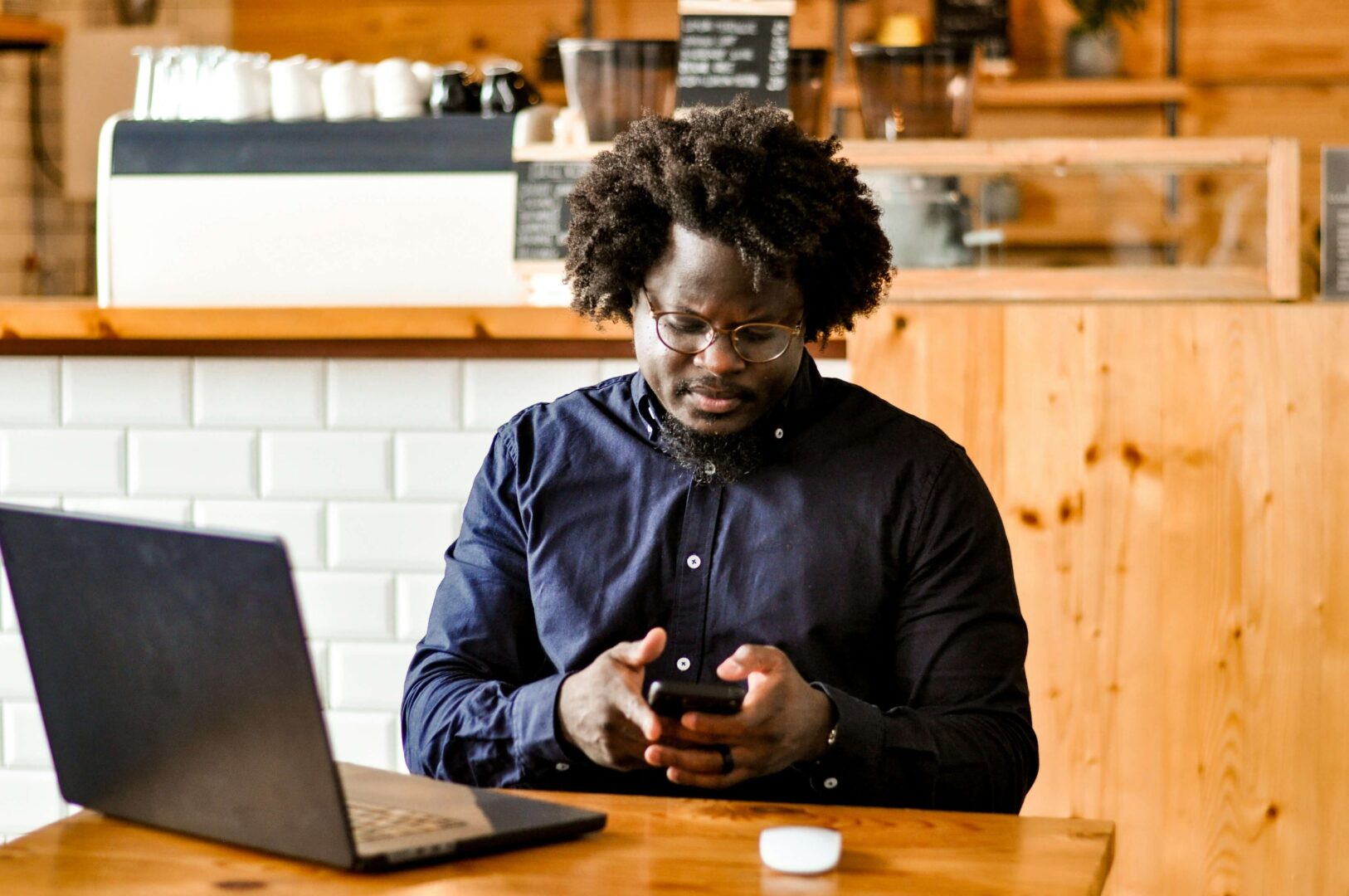 man-using-his-vpn-when-doing-banking-in-a-cafe