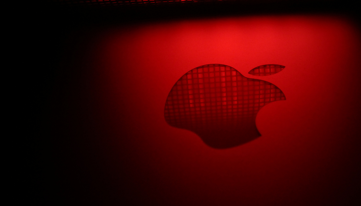 Apple logo on a device, illustrating Apple's delayed foldable iPhone and questions about the company's hardware innovation trajectory.