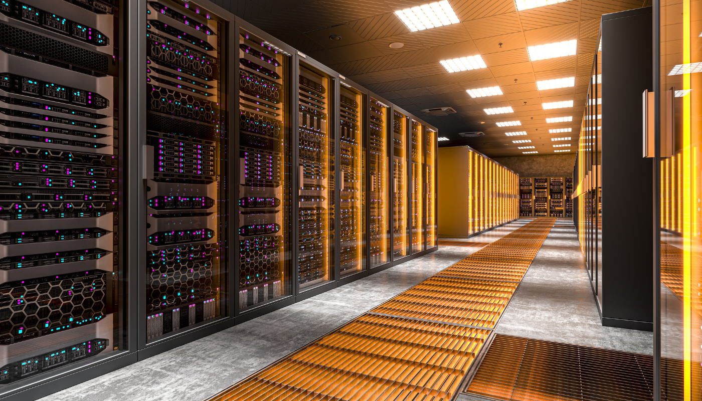 Rows of illuminated server racks in a data centre, representing Nvidia's record-breaking Q1 revenue driven by AI chip demand and the Gulf's growing dependence on Nvidia infrastructure for its sovereign AI ambitions.