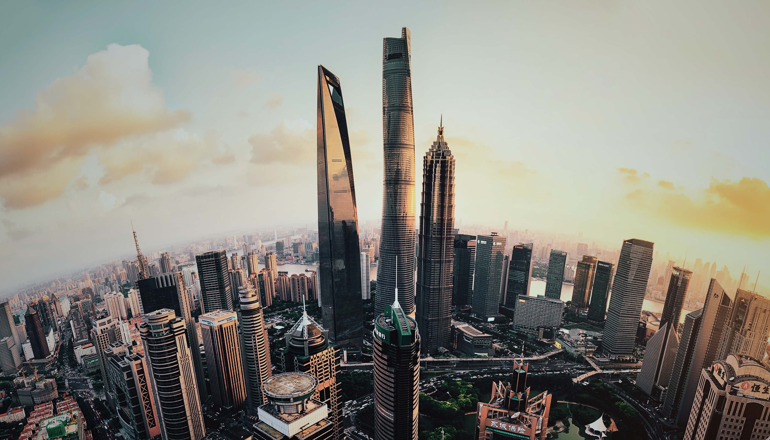 The UAE skyline at dusk, representing the Gulf’s ambitious AI infrastructure buildout including Stargate UAE and the Humain initiative in Saudi Arabia.